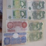 English bank notes, seven pound notes and one 10 Shilling