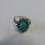 A 9ct hallmarked turquoise cluster ring, size O, approx 3 grams, generally good