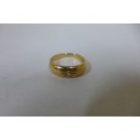 An 18ct yellow gold hallmarked diamond solitaire ring, size Q, approx 6.4 grams