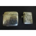 Two silver Vesta cases, including one of Birmingham 1900 - with foliate design, the second