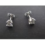 A pair of 18ct white gold diamond stud earrings, each stone measures 0.33 carats, screw on butterfly