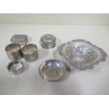 Seven pieces of assorted silver including a pair of serviette rings, total weight approx 7.7 troy