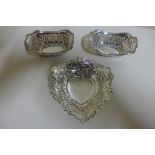 A pair of pierced silver sweetheart dishes, Birmingham 1923 - and a pretty heart shape pierced