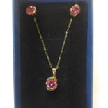 A 9ct yellow gold, pink stone pendant and earrings set - in generally good condition