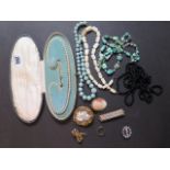 A collection of vintage costume jewellery to include silver framed cameo brooch, turquoise beads,