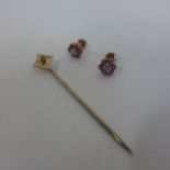 A 9ct gold stick pin, approx 0.7 grams, and a pair of 9ct earrings, approx 1.3 grams