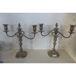 A pair of weighted silver two branch candlesticks, Birmingham 1969/70 - B E S Co - 32cm tall, both