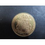 A George IV sovereign marked Georgius IV, dated 1826 sheild back - weight approx 7.9 grams - some