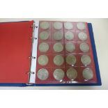 A British silver coin collection, many coins uncirculated - in an eight page folder