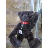 A Steiff Black Bear made in 2004 - limited to 3000 EAN 038150 - 32cm tall with box and certificate