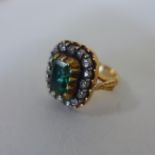 A 19th century and later yellow gold emerald coloured centre and diamond ring