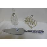 A silver toast rack with four divisions by Richard Woodman, Burbridges 1932 - weight approx 1.8 troy