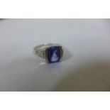 An 18ct white gold sapphire and diamond ring, the sapphire approx 9x8x4.2mm - ring size K, approx