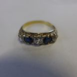 An 18ct sapphire and diamond ring, size P/Q, approx 4.2 grams, minor wear, abrasions, generally