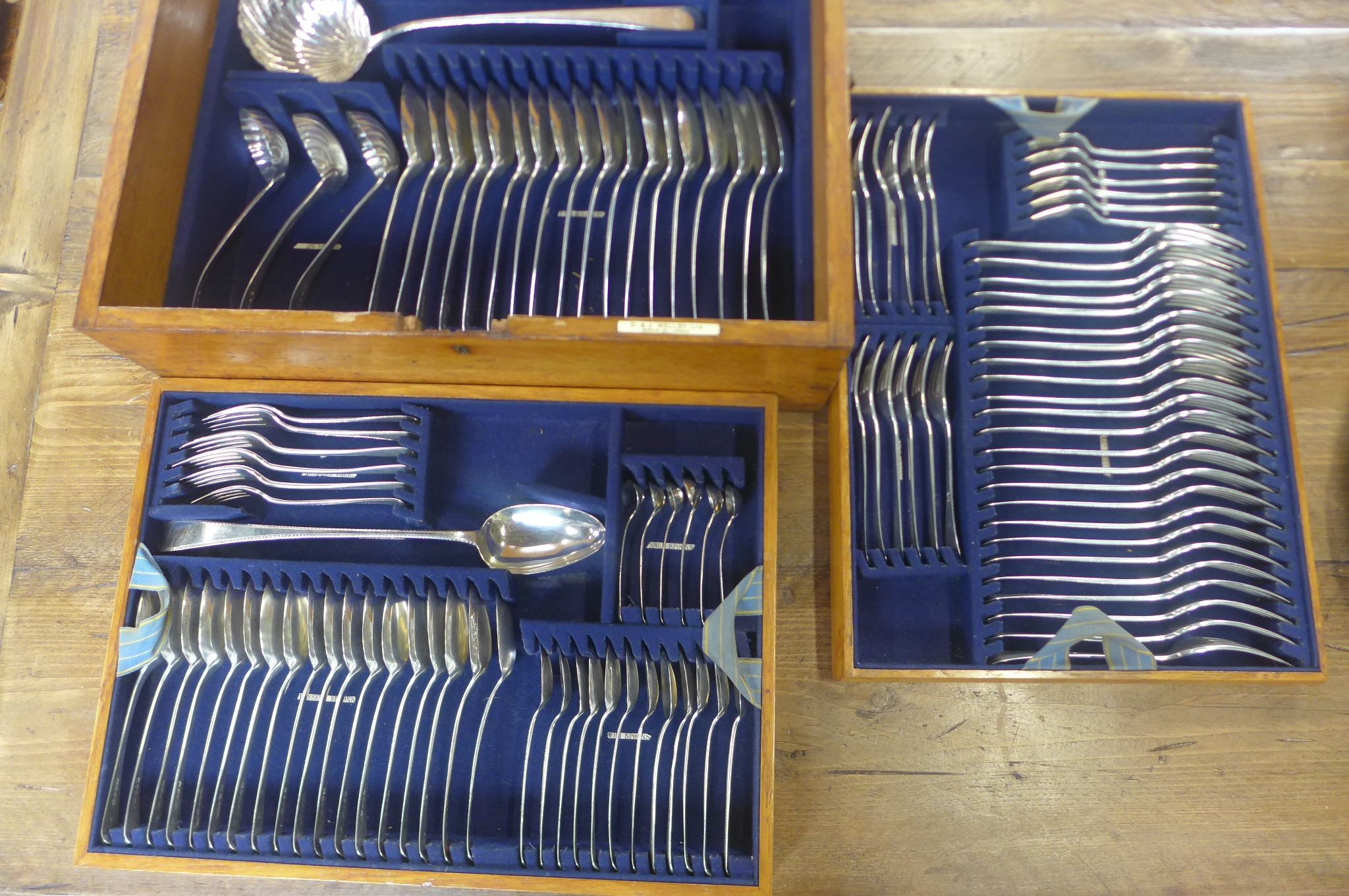 A 105 piece silver canteen of Georgian flatware, mainly by William Eley and William Fearn, London