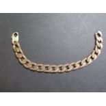 A 9ct rose gold, diamond cut, heavy gauge curb link bracelet with large yellow clasp, a later