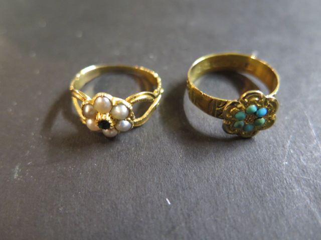 A 9ct gold and turquoise ring,size M, weight 2.1 grams, and an 18ct gold pearl and green stone ring,