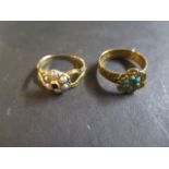 A 9ct gold and turquoise ring,size M, weight 2.1 grams, and an 18ct gold pearl and green stone ring,