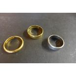 Three gold wedding bands, one 22ct, approx weight 5.5 grams, one 18ct gold, approx weight 4.6