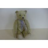 A steiff bear circa 1948-50 - blank button to ear, 38cm tall, plush fur, cotton pads, some wear