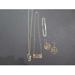 An 18ct gold identity bracelet, pair of earrings and two pendants and chains, all stamped 18ct or