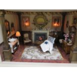 A 12th scale 'Ladies Day room' dolls house room box, fully furnished and lit by battery operated