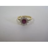 A good 18ct hallmarked ruby and diamond cluster ring, head approx 10mm wide, ring size J - approx
