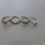 Four hallmarked 9ct gold dress rings, approx 6.5 grams