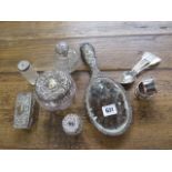 Six pieces of silver back dressing table pieces, two silver serviette rings and five silver