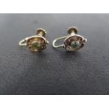A pair of 9ct gold and peridot Art Nouveau style screw back earrings, stamped 9ct, weight approx 1.8