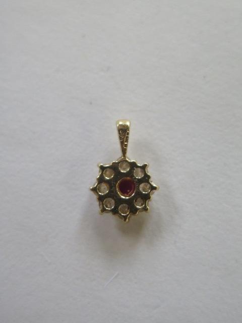 A hallmarked diamond and ruby pendant, 10mm wide, diamond approx 0.46ct, ruby approx 0.39ct - approx - Image 2 of 2
