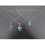 A silver, malachite, amethyst and turquoise pendants on silver chains