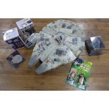 A Star Wars Millennium Falcon and five other Star Wars pieces