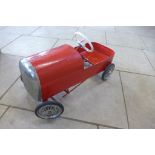 A vintage metal pedal car, working order, repainted