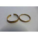 A 9ct band ring size Q and a 9ct cut ring both hallmarked, total weight approx 3.4 grams