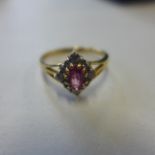 An 18ct yellow gold ruby and diamond ring, size M, approx 3.2 grams, in generally good condition