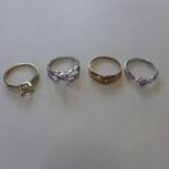 Four hallmarked 9ct gold dress rings, approx 8.5 grams