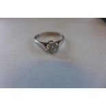 An 18ct white gold solitaire ring, diamond approx 0.70ct, ring size N, approx 3 grams, diamond
