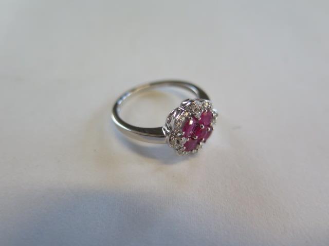 A 14ct white gold four stone ruby and diamond ring, size N, approx 2.9 grams, in good condition - Image 2 of 3