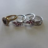 Four hallmarked 9ct gold dress rings, approx 8.1 grams