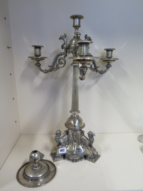 An impressive silver plated three branch centrepiece with triform camel base, 58cm tall, original