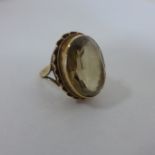 A hallmarked 9ct yellow gold citrine ring size J, head 22x16mm - approx 5.8 grams