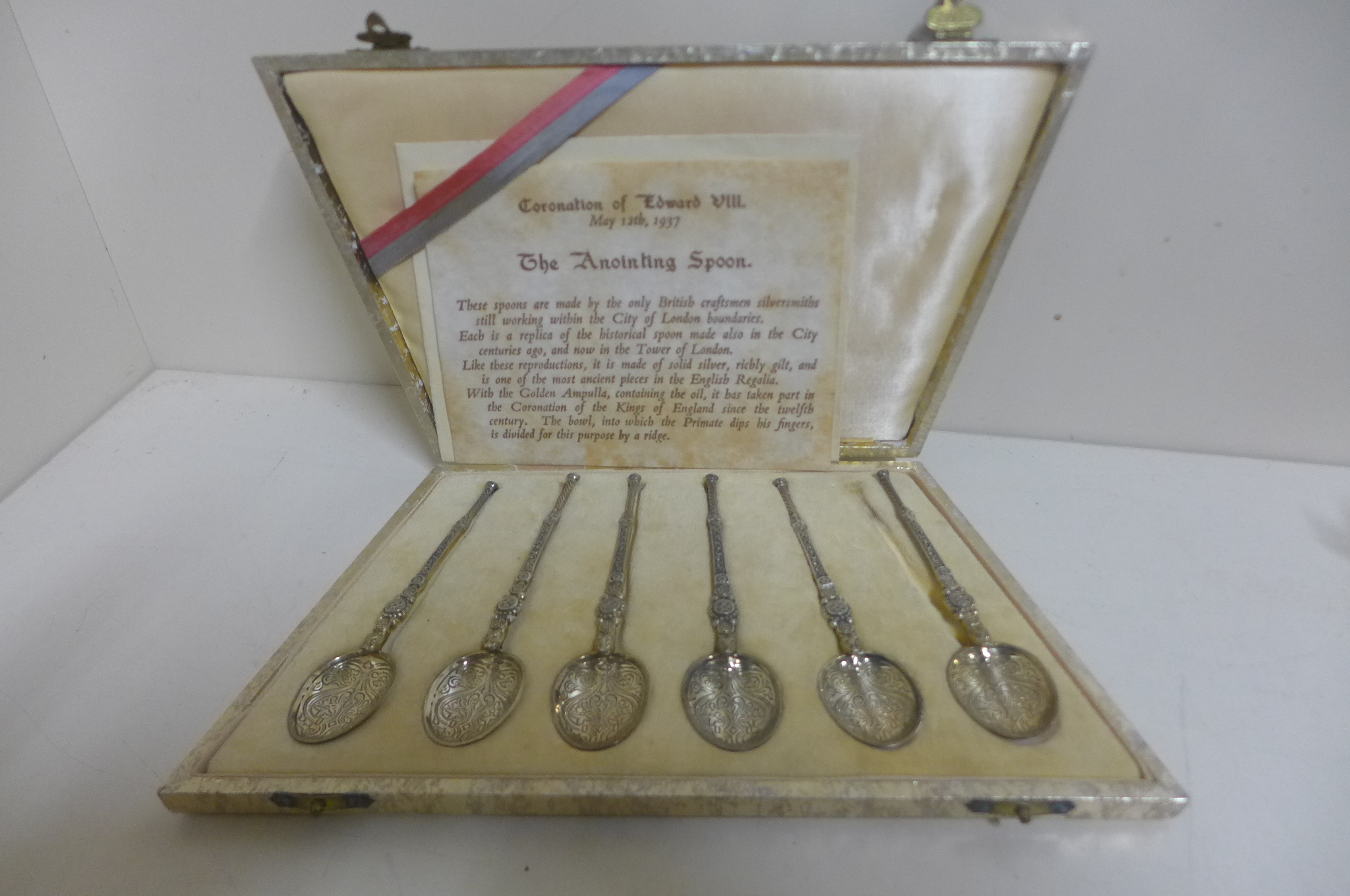 A set of six Edward VIII silver gilt spoons, made by Saunders and Shepherd 1936 - in original Art