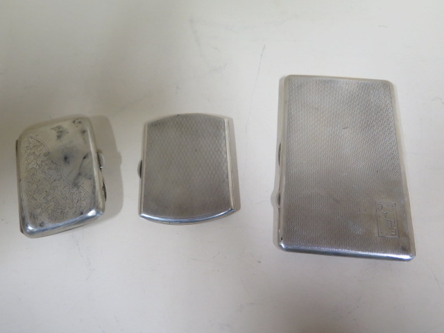 Three silver cigarette cases, approx 11.1 troy oz, general usage, small dents, all open and close