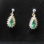 A pair of 18ct yellow gold, emerald and diamond earrings, approx 2.6 grams - in generally good