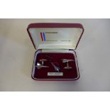 A hallmarked silver Concorde set of cufflinks and a tie pin, generally good condition