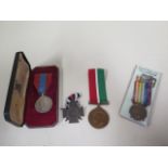 Three medals and a 1914/1918 medallion to include France medal for Libya campaign 1926 -
