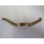 A 9ct gold curb link identity bracelet, no name engraved, weight approx 70 grams - each link stamped