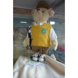 A Steiff Golfer bear, made in 2001 - limited to 3000, EAN 670671 - 32cm tall, with embroidered bag