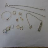 Five pairs of 9ct gold earrings, a silver ingot on chain, a silver watch chain, four dress rings and